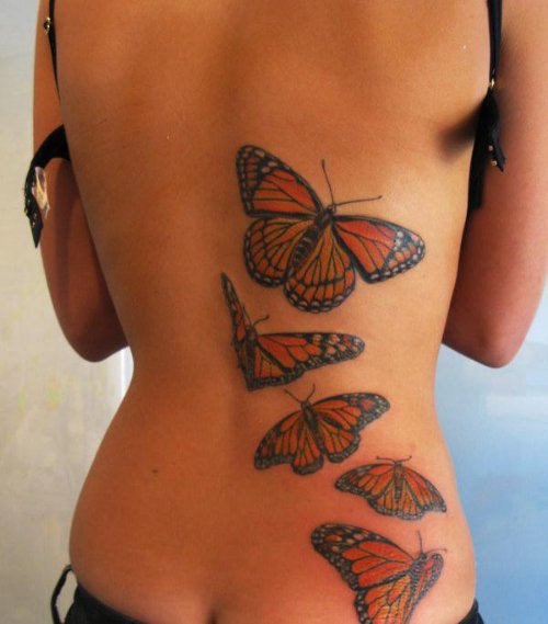 Colored Flying Birds Feminine Tattoo On Back Body