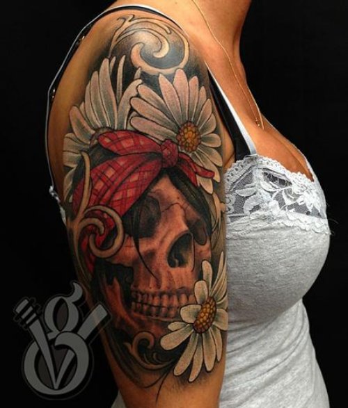 Grey Ink Skull And Feminine Flowers Tattoo