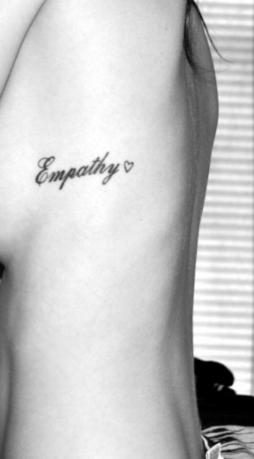 Empathy Feminine Tattoo On Girl Side Rib