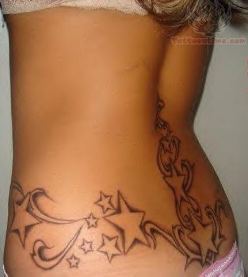 Feminine Stars Tattoos On Lower Back