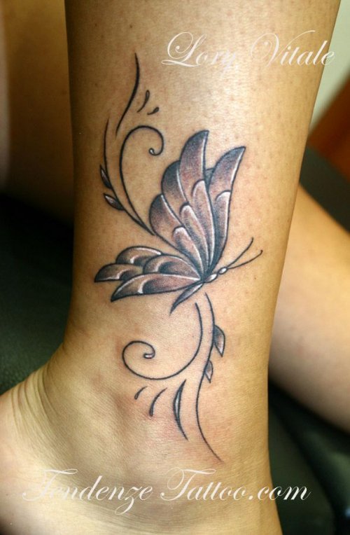 Grey Ink Butterfly Feminine Tattoo On Leg