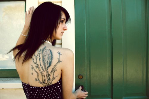 Grey Ink Bird And Feminine Tattoo On Back Shoulder