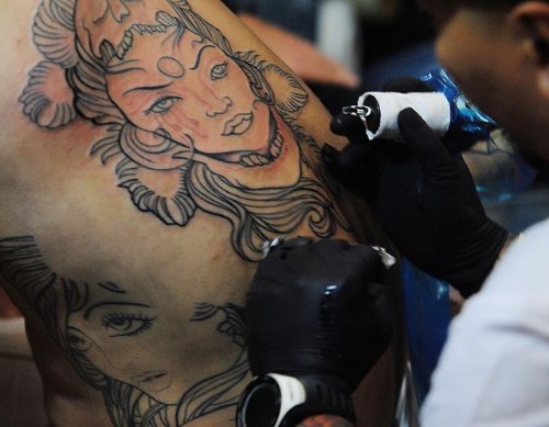 Amazing Grey Ink Filipino Tattoo On Back Body