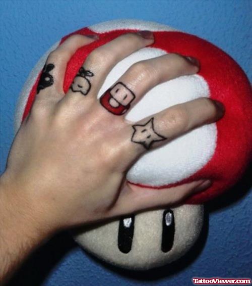 Color Mushroom And Star Finger Tattoo