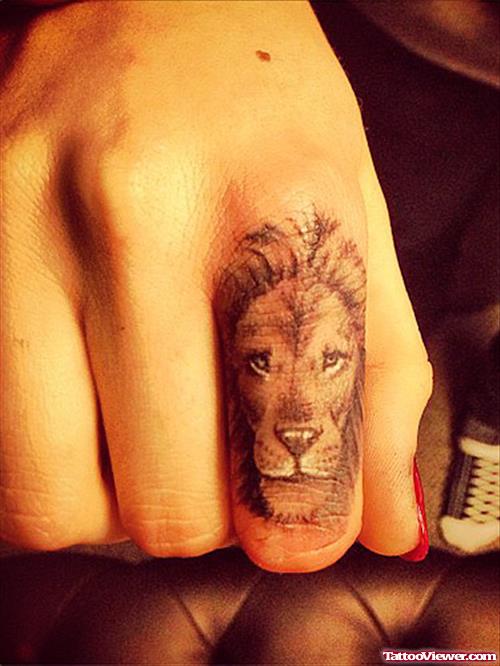 Lion Head Finger Tattoo
