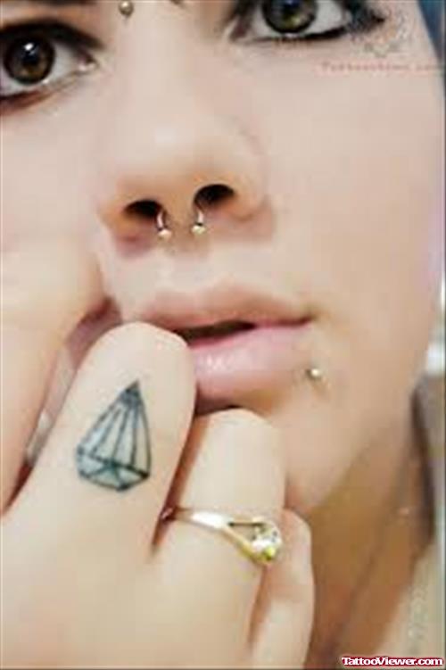 Small Diamond Finger Tattoo