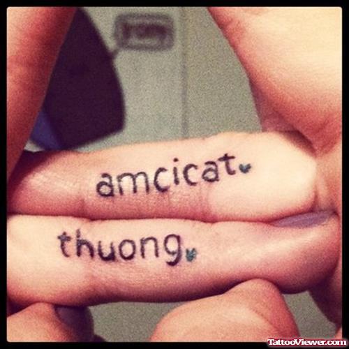 Amcicat Thuong Finger Tattoos