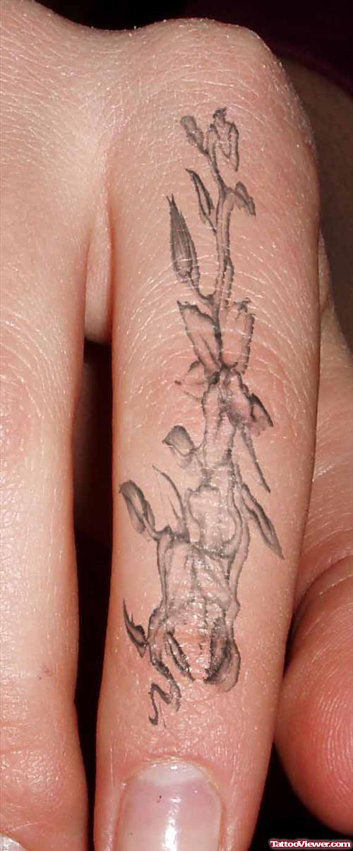Grey Ink Flower Finger Tattoo