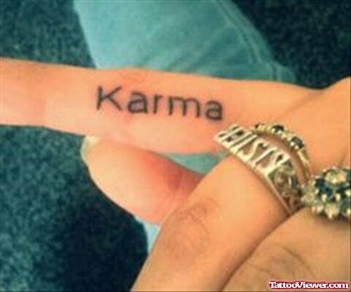 Karma Finger Tattoo