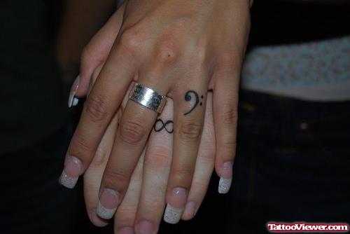 Symbol Finger Tattoos For Girls