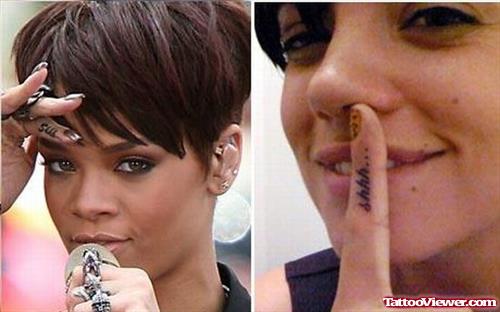 Attractive Rihanna With Finger Tattoo