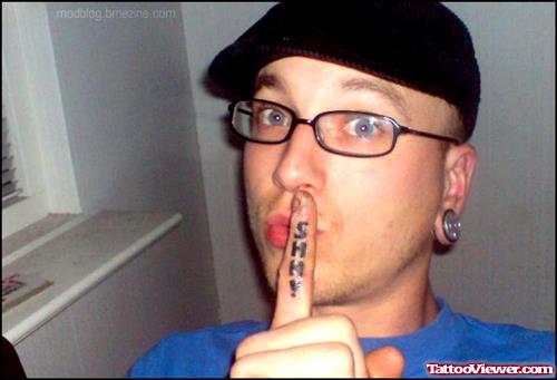 Man With Shhh Finger Tattoo