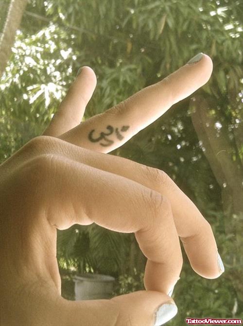 Om Religious Symbol Finger Tattoo