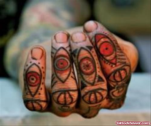 Colored Eye Finger Tattoos