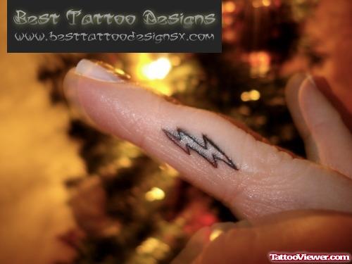 Energy Symbol Finger Tattoo