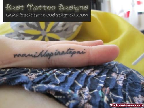 Black Ink Word Finger Tattoo