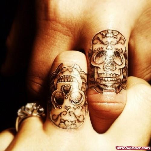 Grey Ink Skulls Finger Tattoos