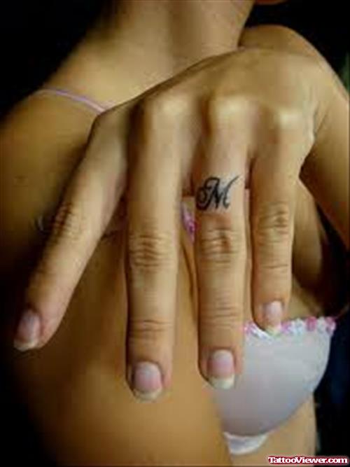 Attractive Alphabet M Finger Tattoo