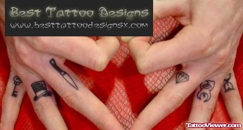 Diamond And Molar Finger Tattoo