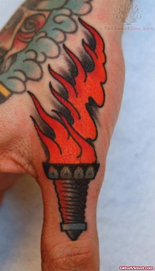 Flaming Tattoo On Thumb