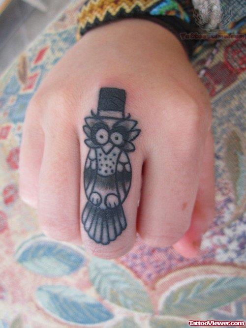 Black Owl Tattoo On Finger