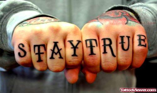 Stay True Tattoo on Fingers