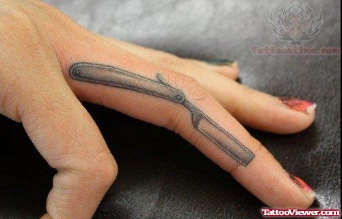 Shaving Razor Tattoo On Finger