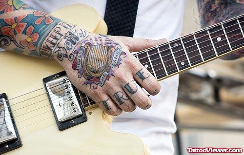 True Tattoo On Finger