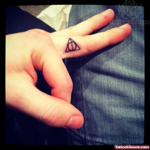 Triangle and Circle Tattoo On Finger