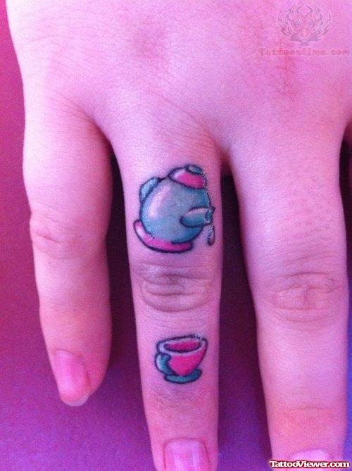 Tea Cattle And Cup Tattoo On Finger
