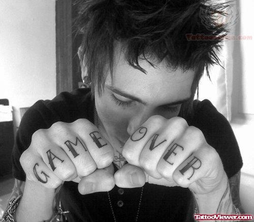 Game Over Tattoo On Boy Fingers