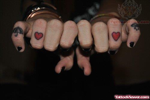 Tiny Red Hearts Tattoos On Fingers