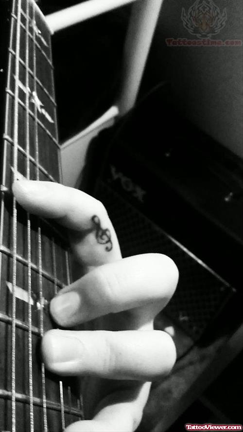 Music Note Tattoo On Finger
