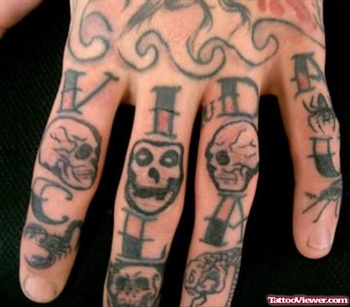 Skulls Tattoos On Fingers