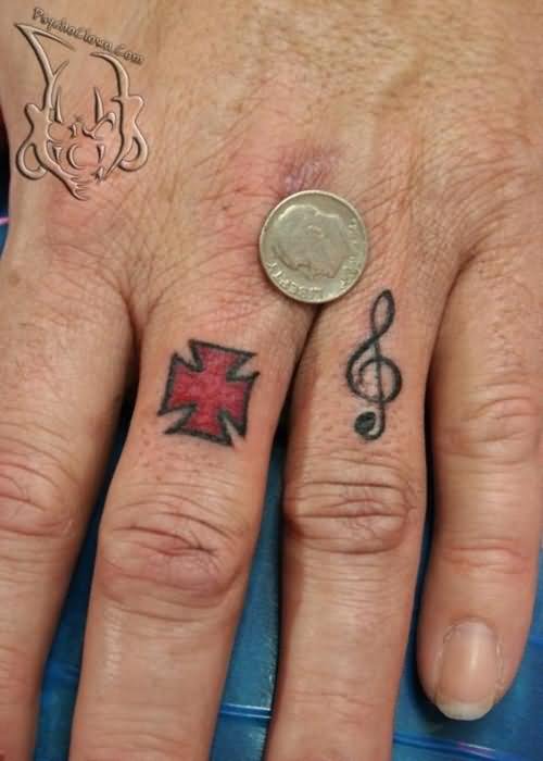Cross And Music Tattoo On Finger