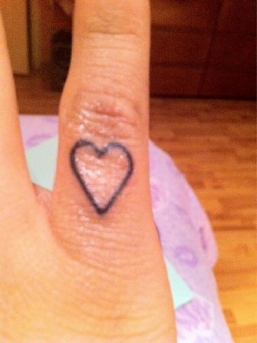 Tiny Heart Tattoo On Index Finger