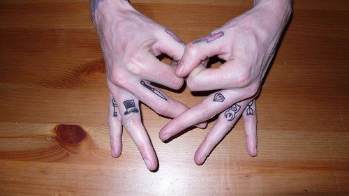 Diamond And Molar Finger Tattoos