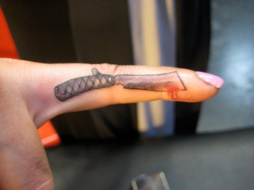 Knife Tattoo On Finger