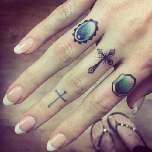 Small Cross Tattoos On Finger
