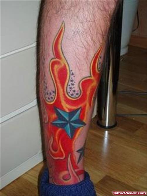Bautical Star And Fire n Flame Tattoo On Leg