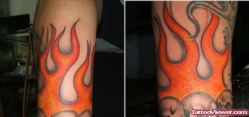 Grey Ink Skulls With Fire And Flame Tattoo