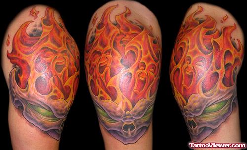 Flaming Skull Tattoo On Right Shoulder