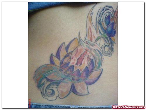 Lotus Flower And Fire Flame Tattoo On Back
