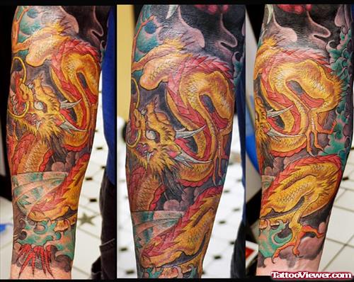 Dragon In Fire And Flames Tattoo On Arm