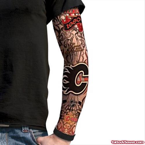 Colored Fire and Flame Tattoo On Man Sleeve