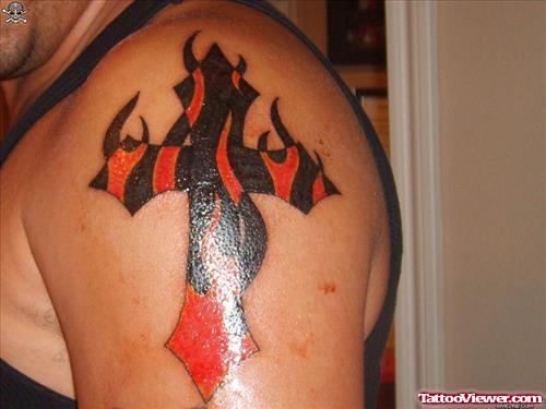 Flaming Cross Tattoo On Man Left Shoulder