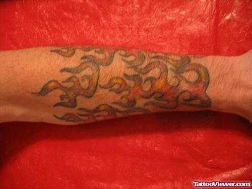 Red Fire Flame Tattoo On Arm