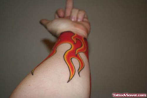 Fire And Flame Tattoo On Left Forearm