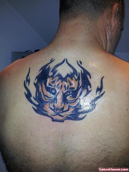 Tribal Tiger Head In Flames Tattoo On Upperback