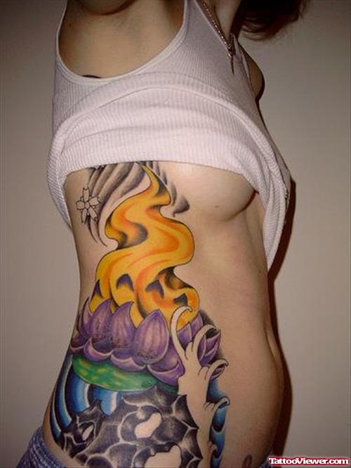 Flaming Lotus Tattoo On Side Rib